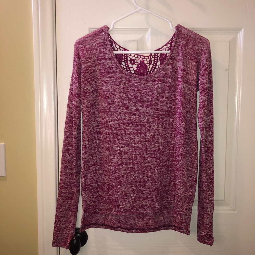 Long sleeve knitted blouse.Laced v back.